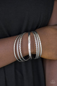 Rattle and Roll - Silver Bangle Bracelet